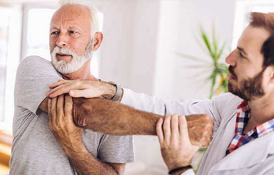 Patient getting a chiropractic shoulder adjustment at San Ramon Auto Accident Injury Clinic in San Ramon