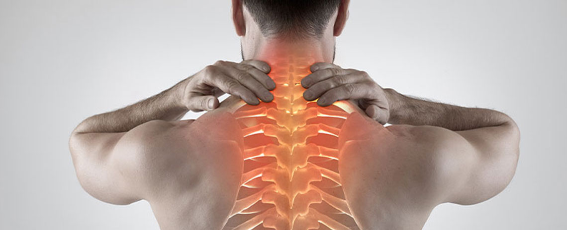 Man suffering with upper back pain